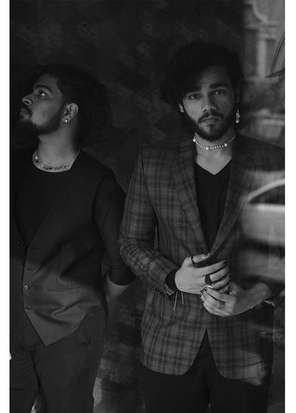Fashion editorial portrait of two men in suits — Chicago brand campaign photography