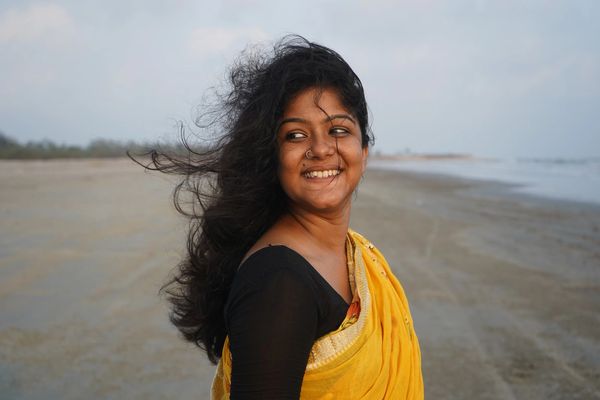 Creative portrait of a woman at the beach — editorial photography, India by byag.studio